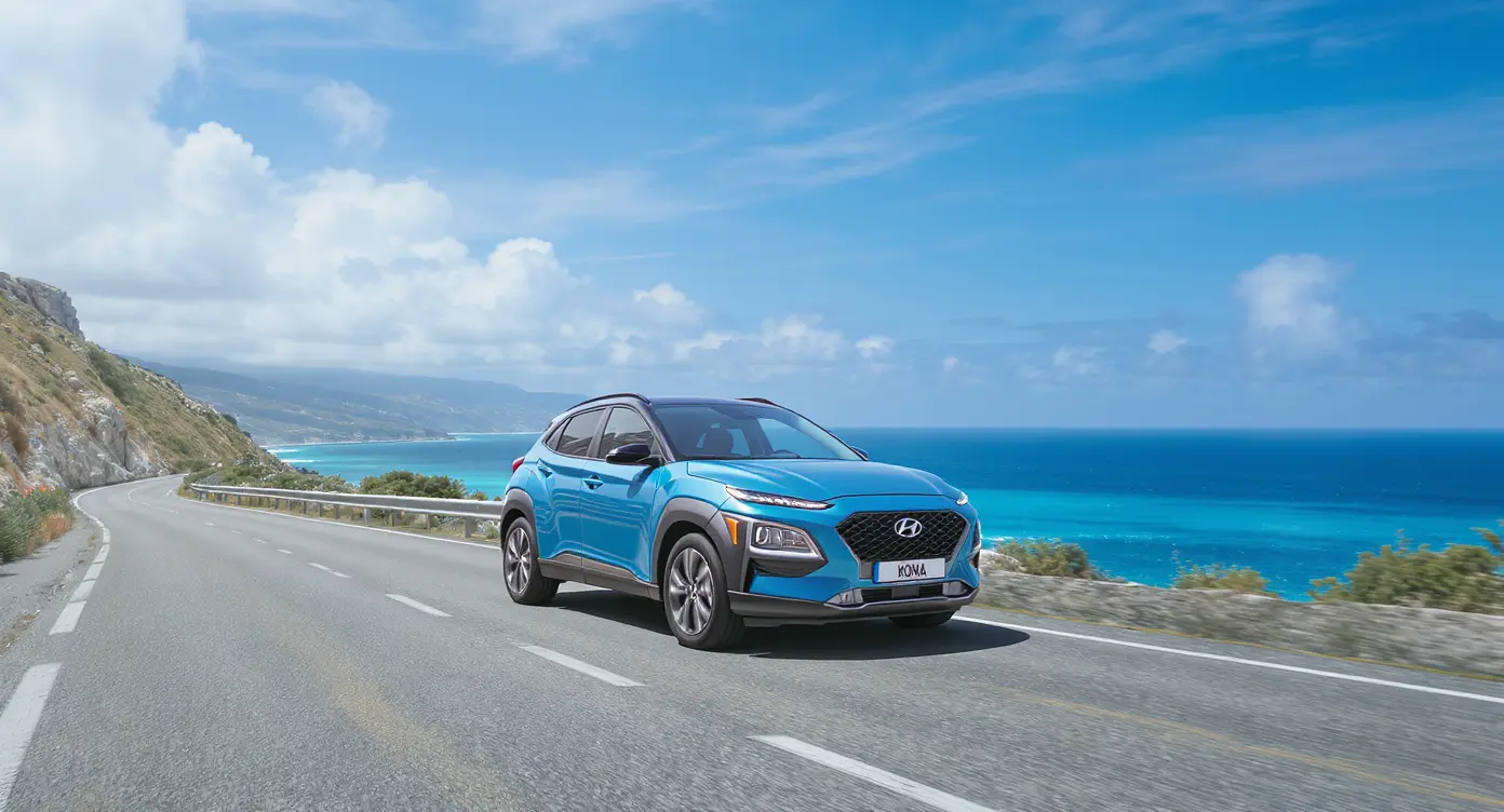 Hyundai Kona Hybrid Bychon sur route côtière Guadeloupe - location voiture hybride éco-responsable